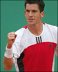 Henman celebrates his win