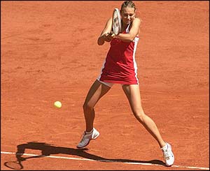 Russia's Maria Sharapova in action against compatriot Vera Zvonareva