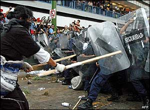 Rioters clash with police