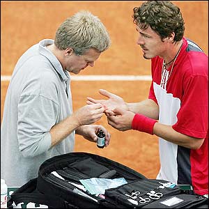 Safin eventually manages to win a set but cannot hold on in the fourth and loses it 3-6