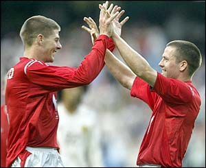 England's Steven Gerrard congratulates goalscorer Michael Owen