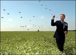 Prince Charles watches the Parachute Regiment jump into Ranville, Normandy 
