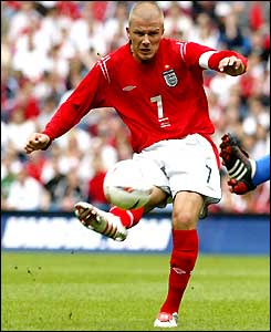 David Beckham gets in a cross