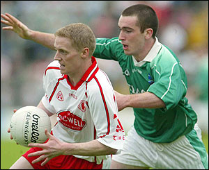 Colm McCullagh and Liam McBarron in action at Clones in the Ulster Championship quarter-final