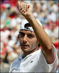 Sebastien Grosjean celebrates his win