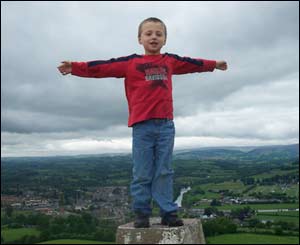 Christopher Evans' son Daniel on top of Garth Hill which overlooks Builth Wells 