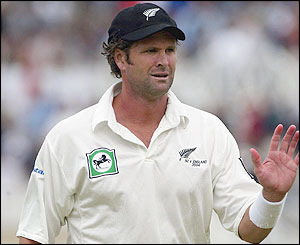 Chris Cairns leaves the field