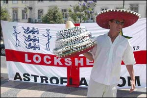 A fan sells his wares in Lisbon