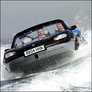 The amphibious car glides over the Channel