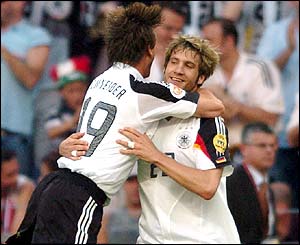 Bernd Schneider congratulates Torsten Frings