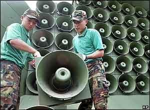 South Korean soldiers remove loudspeakers used for propaganda near the DMZ, in Paju city, north of Seoul, Wednesday, June 16, 2004