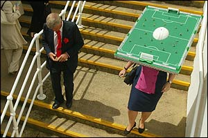 A lady's football hat attracts admiring glances