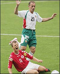 Zoran Yankovich of Bulgaria clashes with Daniel Jensen