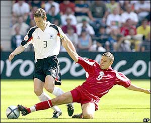 Maris Verpakovskis challenges German defender Arne Friedrich