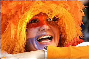A Dutch fan enjoys the atmopshere at the Aveiro Municipal stadium as kick-off approaches against the Czech Republic
