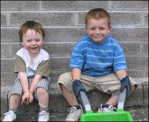 Leanne Brain's son Morgan Brain and nephew Tomas Skelding looking worn out and dirty after helping in the garden