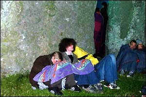 Revellers waiting for sunrise at Stonehenge