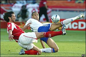 France's David Trezeguet and Switzerland's Murat Yakin