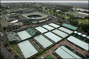 The covers remain in place on Wimbledon's courts