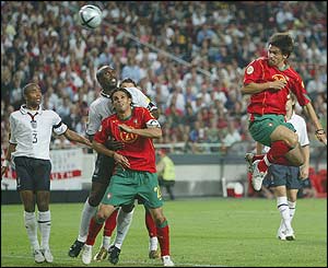 Ashley Cole and Sol Campbell are stranded as Helder Postiga equalises for Portugal