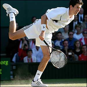 Henman serves to Philippoussis