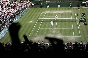 The crowd erupts on Centre Court as Henman wins the thriller