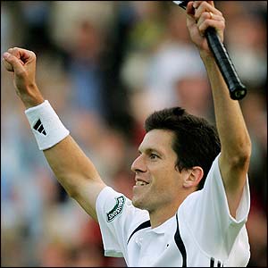 Henman celebrates his dramatic win over Philippoussis