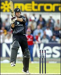 Stephen Fleming smashes the ball to the boundary