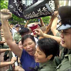 Pro-democracy activists carried a mock coffin saying 