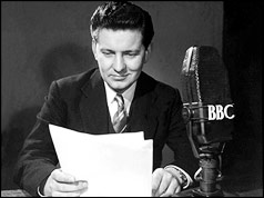 Richard Baker reading the news