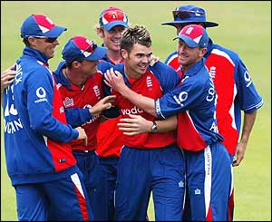 James Anderson's team-mates congratulate him on an impressive performance