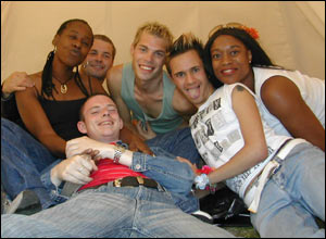 Friends relax in a teepee