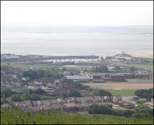 Sean Wright sent in this picture of Burry Port harbour looking over to Gower