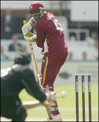 West Indies Chris Gayle edges a delivery to Scott Styris at slip
