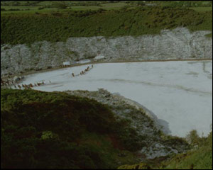 The snow on the ground is merely paper, while those green hills are simply not suitable.