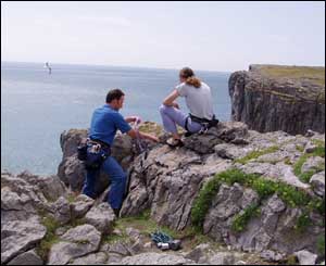 Climbers contemplating their descent at St Govan's area near Bosherston (Dave Perry)
