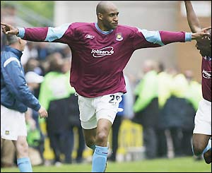 Brian Deane celebrates a late equaliser for West Ham United