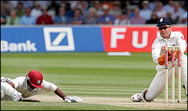 Chanderpaul dives for the line to get his 100 - he is on 123 not out as the WI manage 398-6 at tea