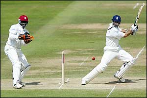 Vaughan plays a cut shot to the boundary as England hit the ball all around Lords