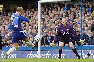Eidur Gudjohnsen helps Chelsea to a 2-0 half-time lead