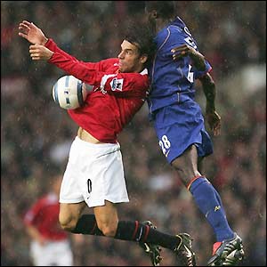 Dutch striker Ruud van Nistelrooy finds his path to goal blocked on several occasions