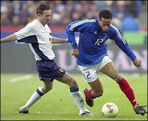 France's Thierry Henry beats Paul Lambert