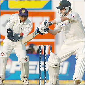 Michael Clarke impresses again as he hangs on to get Australia through a rough patch