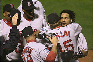 Manny Ramirez in congratulated by his team-mates