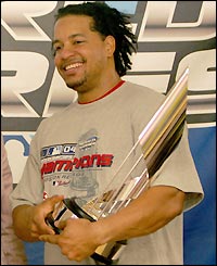 Outfielder Manny Ramirez with his MVP award