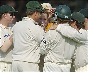 Australia's cricketers mob Shane Warne