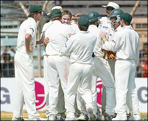 Nathan Hauritz is congratulated on the wicket of Sachin Tendulkar 