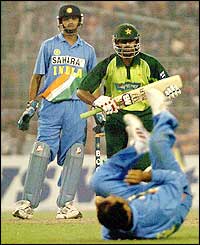 Malik hits 61 from 55 balls in a partnership with Salman Butt before getting out to Sehwag