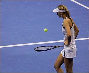 Sharapova prepares to serve