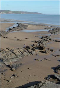 From the coastal path between Saundersfoot and Wiseman's bridge by Ken Passmore from Radyr, Cardiff. His wife Ann is walking over the rocks.